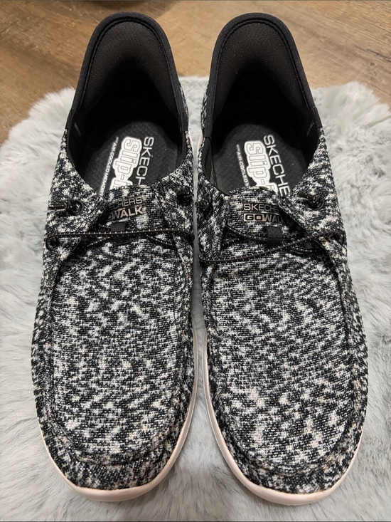 Skechers Shoes - Skechers GO WALK Slip-ins featuring a black and white heathered knit upper.